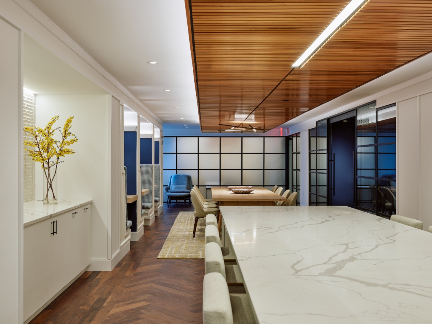Coworking table by kitchen.