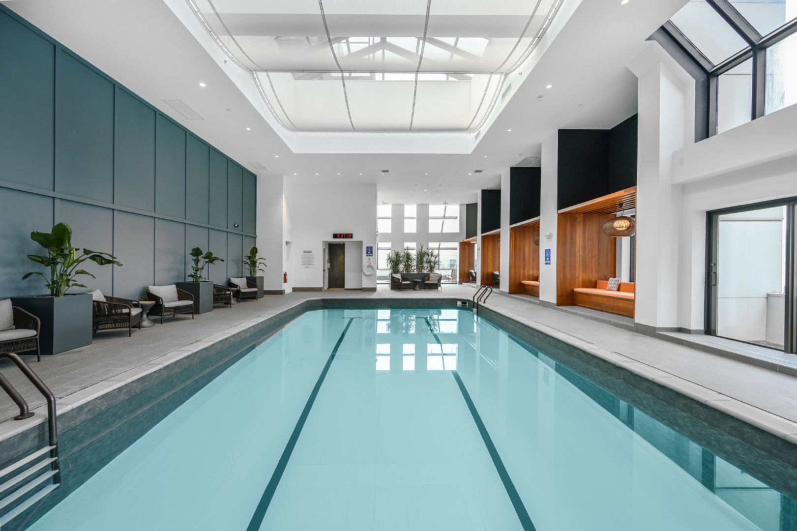 Indoor pool with seating.