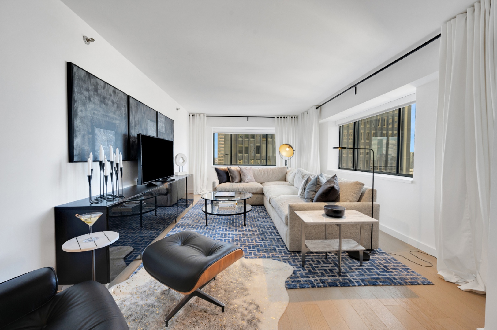 Alternate view of living room with windows.